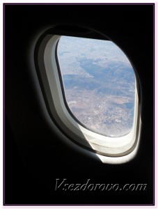 Вид из иллюминатора во время полета фото